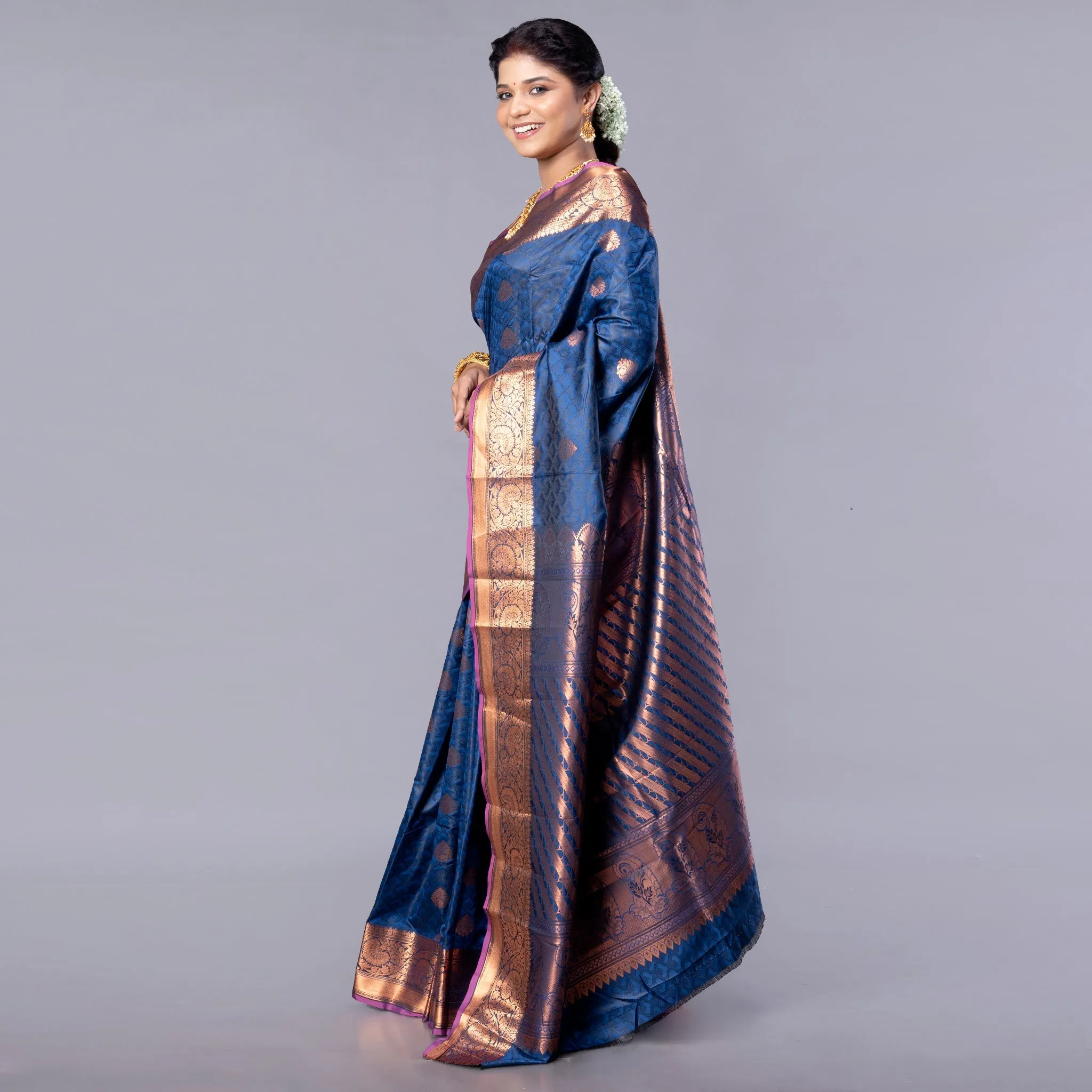 Women Kanjivaram Silk Saree In Royal Blue Color With Zari Motifs And Pallu