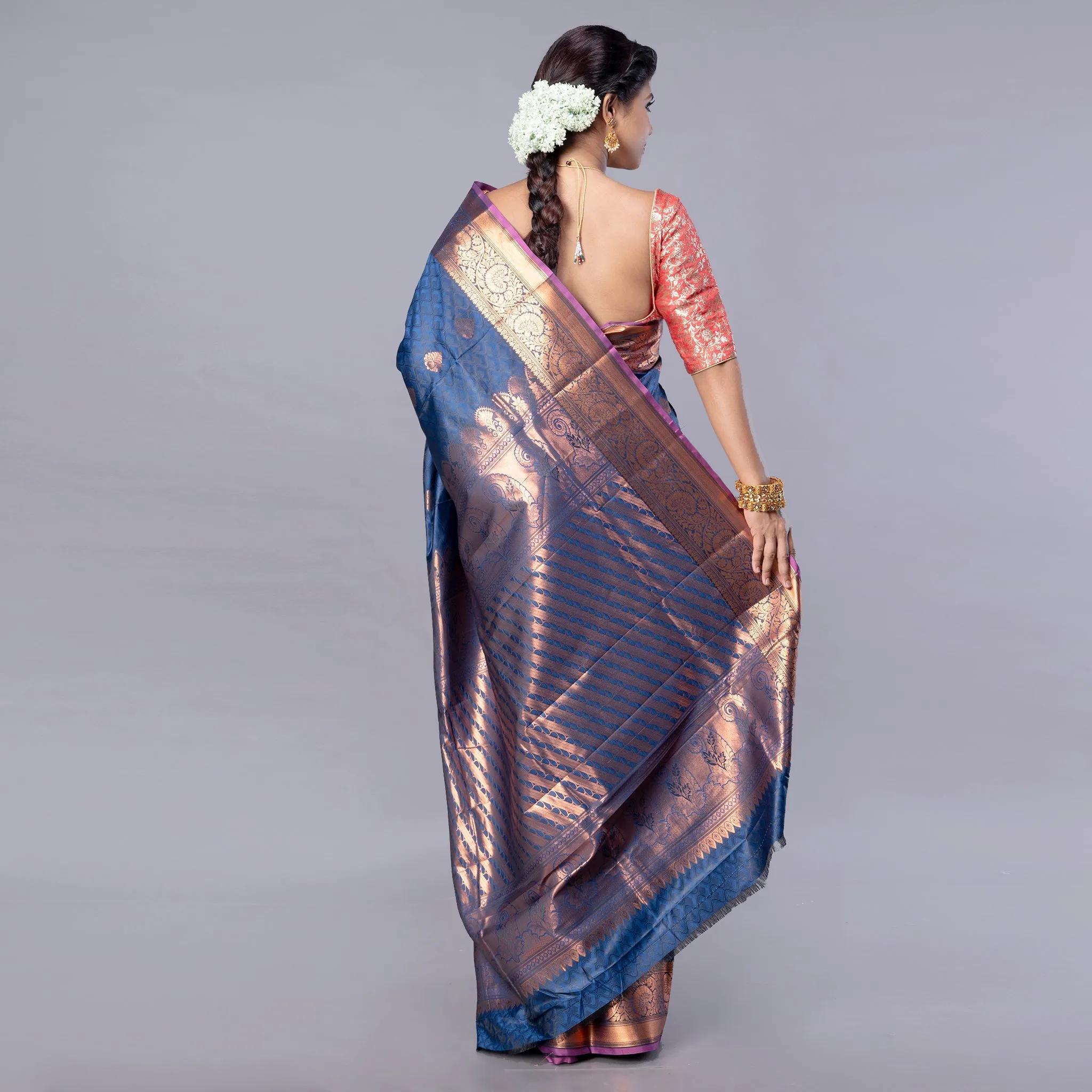 Women Kanjivaram Silk Saree In Royal Blue Color With Zari Motifs And Pallu